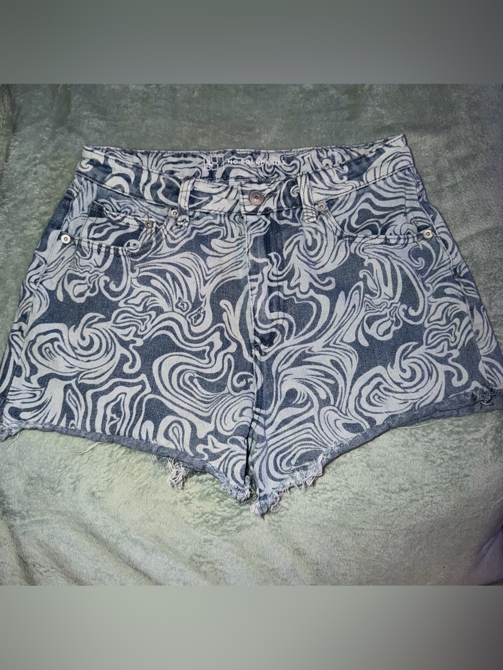 No Boundaries by walmart white and blue swirl denim shorts.